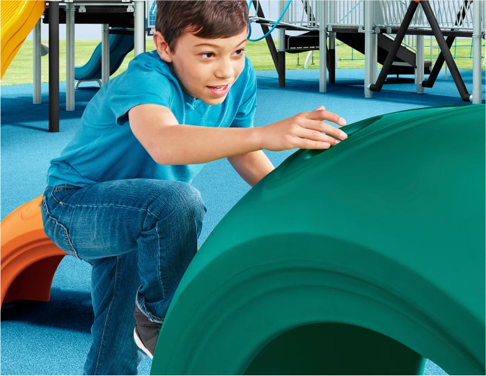 child playing on Little Tikes playground