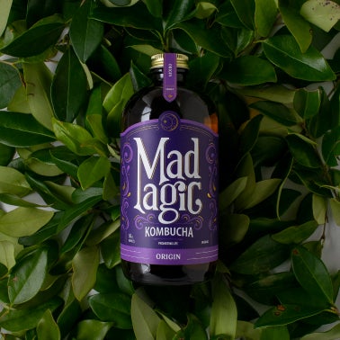 Mad Magic bottle with matching background 